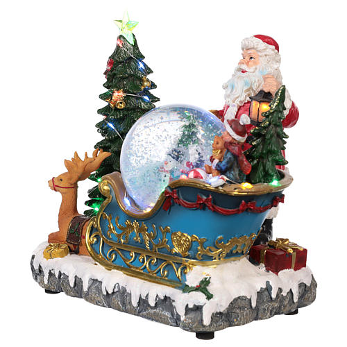 Weihnachtsmann Schlitte mit Schneekugel 25x30x20cm Licht und Musik 3