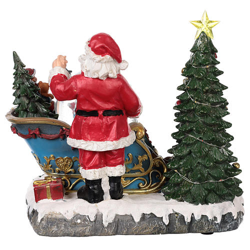 Weihnachtsmann Schlitte mit Schneekugel 25x30x20cm Licht und Musik 5