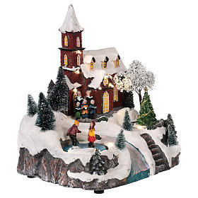 Christmas village church with moving elements, lights and music 30x25x20 cm s4