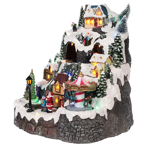 Miasteczko Bożonarodzeniowe krajobraz górski, śnieg, karuzela, ruch, oświetlenie, dźwięk 30x25x15 cm 3