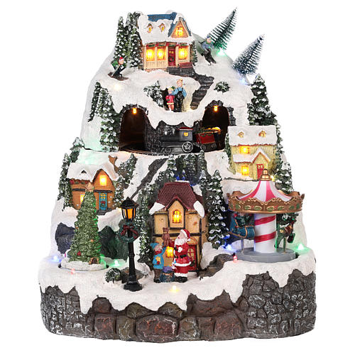 Christmas village with mountain snow carousel motion lights music 30x25x15 cm 1