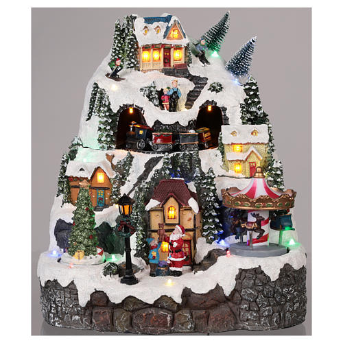Christmas village with mountain snow carousel motion lights music 30x25x15 cm 2