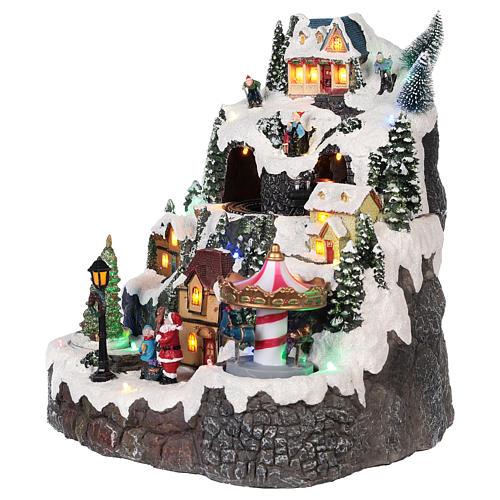 Christmas village with mountain snow carousel motion lights music 30x25x15 cm 3
