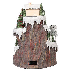 Christmas village with moving elements, lights and music 35x45x35 cm s5