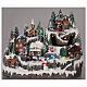 Christmas village with moving elements, lights and music 40x30x30 cm s2