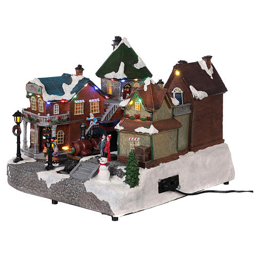 Christmas village train station with moving elements, lights and music 25x35x25 cm 3