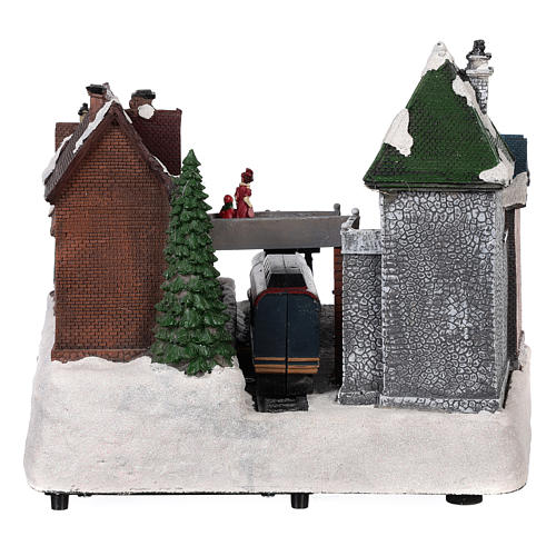 Christmas village train station with moving elements, lights and music 25x35x25 cm 5