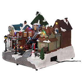 Christmas village with animated train station lights music 25x35x25 s3