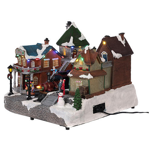 Christmas village with animated train station lights music 25x35x25 3