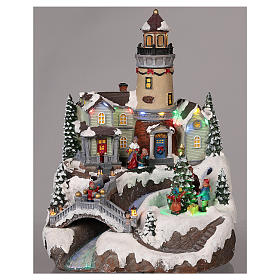 Village Noël avec phare mouvement lumières musique 35x25x25 cm