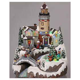 Christmas village with lighthouse movement lights music 35x25x25 cm