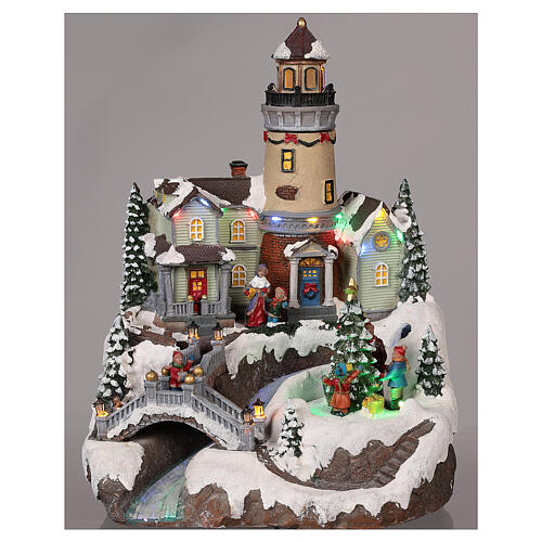 Christmas village with lighthouse movement lights music 35x25x25 cm 2