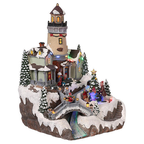 Christmas village with lighthouse movement lights music 35x25x25 cm 4
