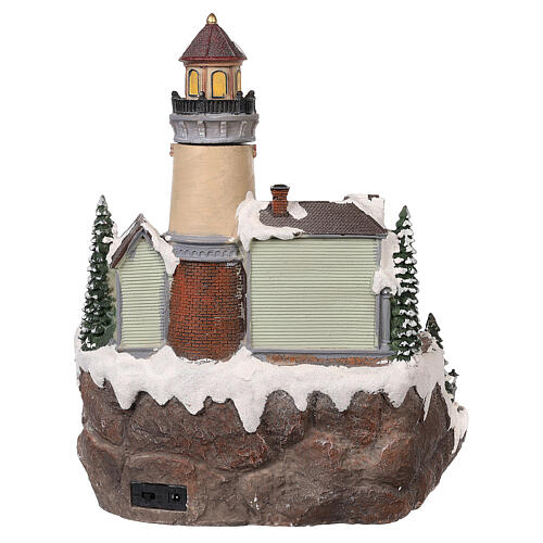 Christmas village with lighthouse movement lights music 35x25x25 cm 5