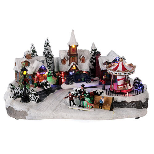 Villaggio invernale auto in movimento musica e luci 40x25x20 cm 1