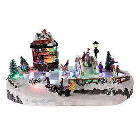 Pueblo Navideño patinaje con tienda 25x20x40 cm