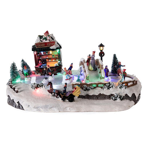 Christmas village with ice rink and shop, 25x20x40 cm 1