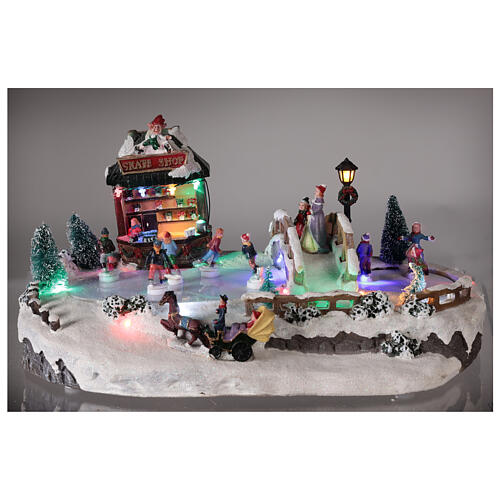 Christmas village with ice rink and shop, 25x20x40 cm 2