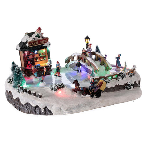 Christmas village with ice rink and shop, 25x20x40 cm 4