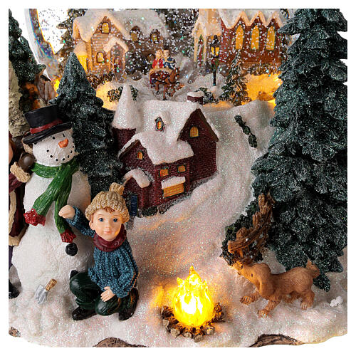 Spieluhr als Schneekugel mit Winterlandschaft und Lichtern, 25x20x25 cm 2