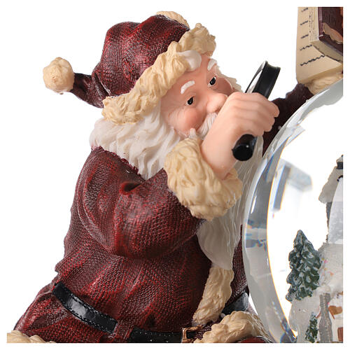 Pozytywka szklana kula Święty Mikołaj z lupą 25x25x20 cm 6