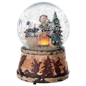 Glitter snow globe snowman fire music 15x10x10 cm