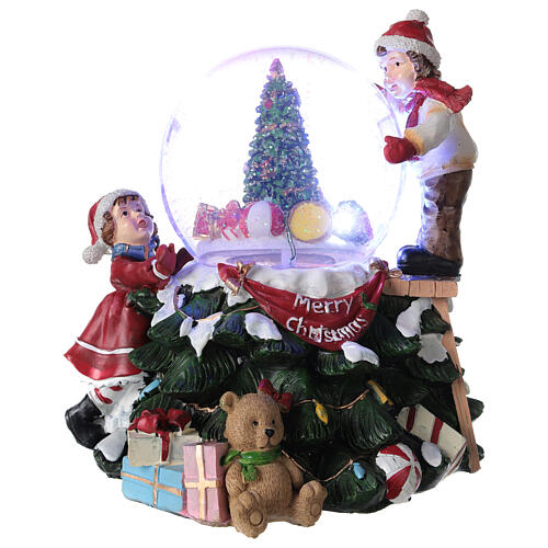 Weihnachtsspieluhr aus Glas mit Glitzer Baum und Kindern, 20x20x20 cm 1