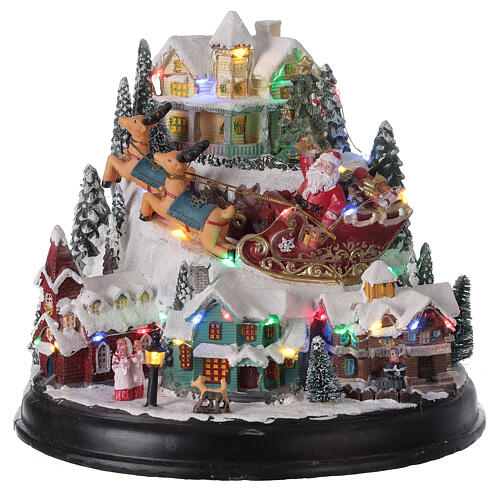 Christmas village Santa sleigh trees lights music 25x30x25 cm 1