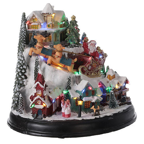 Christmas village Santa sleigh trees lights music 25x30x25 cm 4