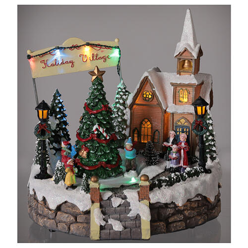 Aldeia de Natal em miniatura iluminada com igreja, coral, árvore de Natal, patinadores e música 19,5x24x24 cm 2