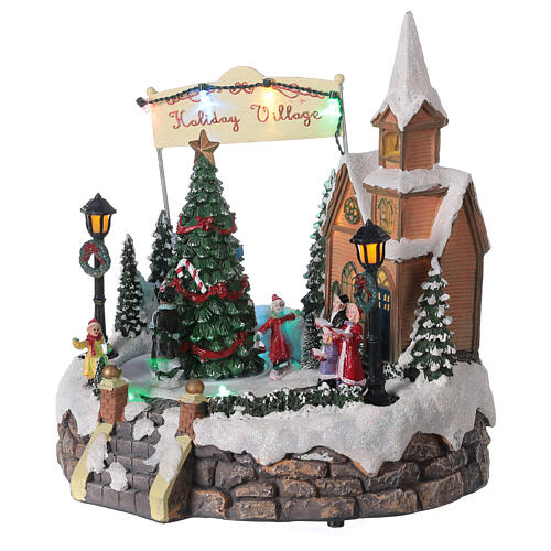 Aldeia de Natal em miniatura iluminada com igreja, coral, árvore de Natal, patinadores e música 19,5x24x24 cm 4