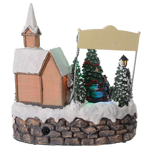 Aldeia de Natal em miniatura iluminada com igreja, coral, árvore de Natal, patinadores e música 19,5x24x24 cm 6