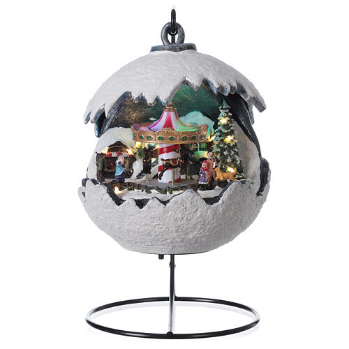 Schneekugel mit weihnachtlichem Karussell Lichtern und Musik, 20x20x20 cm 1