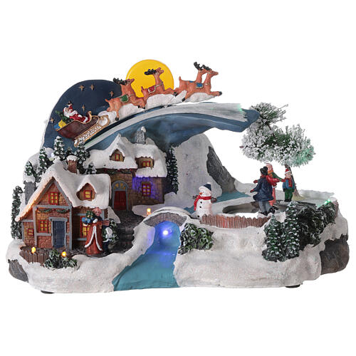 Cenário de Natal em miniatura aldeia nevada com Pai Natal no trenó e lua cheia, luzes LEd e música, 20x35,5x21,5 cm 1