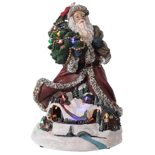 Pai Natal com aldeia iluminada e trem em miniatura resina luzes e música, 33,5x22,5x23,5 cm 1