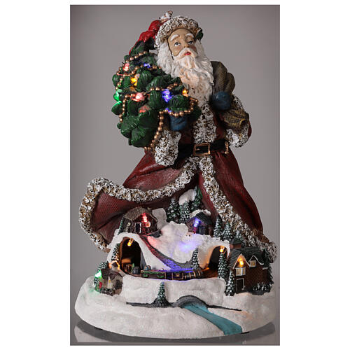 Pai Natal com aldeia iluminada e trem em miniatura resina luzes e música, 33,5x22,5x23,5 cm 2
