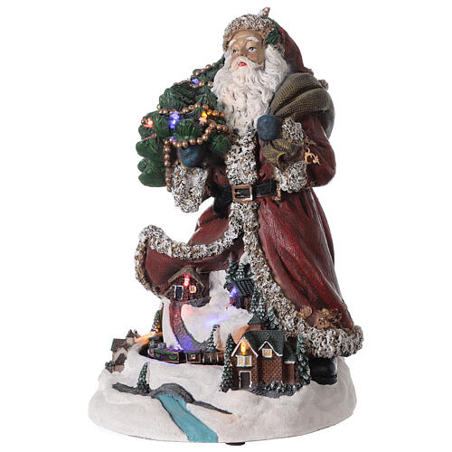 Pai Natal com aldeia iluminada e trem em miniatura resina luzes e música, 33,5x22,5x23,5 cm 3