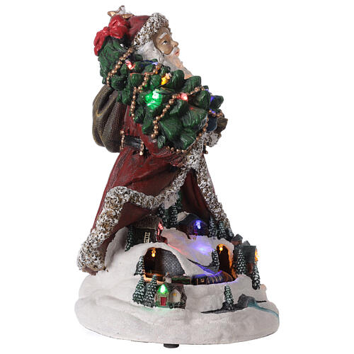Pai Natal com aldeia iluminada e trem em miniatura resina luzes e música, 33,5x22,5x23,5 cm 4
