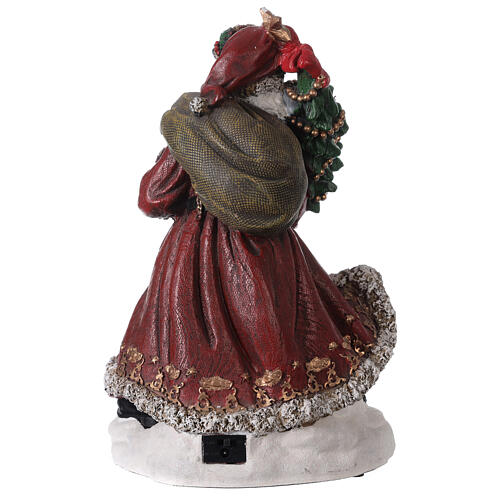 Pai Natal com aldeia iluminada e trem em miniatura resina luzes e música, 33,5x22,5x23,5 cm 5