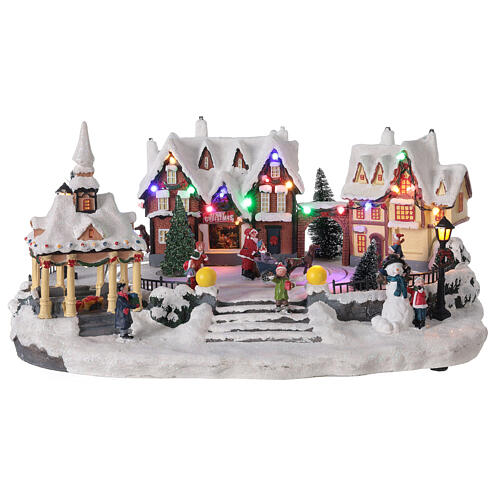 Aldeia de Natal nevada em miniatura com praça, luzes LED e música 23x43,5x30 cm 1