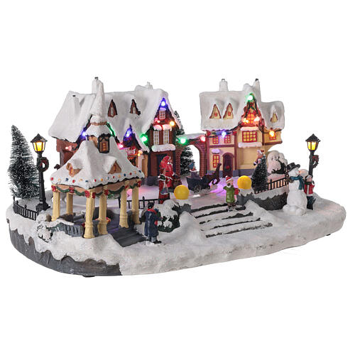 Aldeia de Natal nevada em miniatura com praça, luzes LED e música 23x43,5x30 cm 3