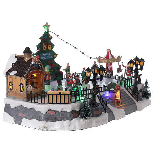 Ice rink Christmas village lights music 20x40x30 cm 4