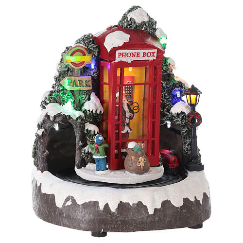 Cenário natalino em miniatura cabina telefónica Pai Natal comboio, luzes e música, 22x19x18 cm 4