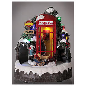 Cenário natalino em miniatura cabina telefónica familia e trenó, luzes e música, 22x19x18 cm