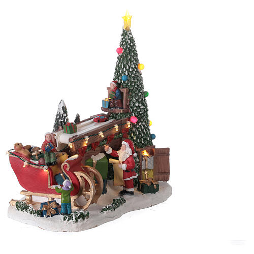 Village Noël atelier cadeaux Père Noël lumières musique 30x30x15 cm 5