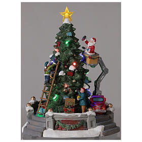 Árvore de Natal em miniatura com Pai Natal no guindaste, luzes e música, 27x21x21 cm