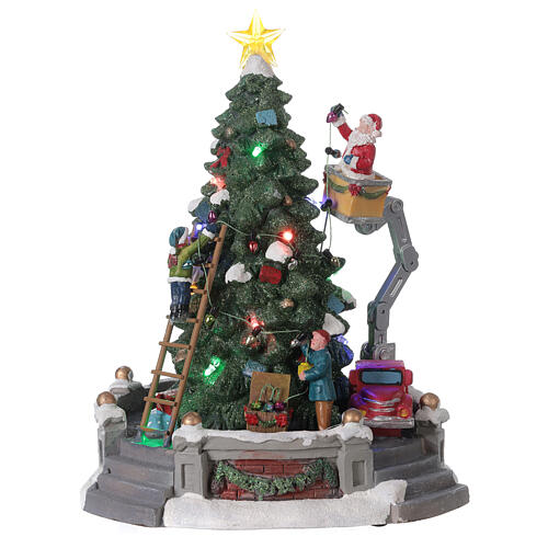 Árvore de Natal em miniatura com Pai Natal no guindaste, luzes e música, 27x21x21 cm 1