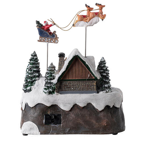 Aldeia de Natal em miniatura com riacho e o Pai Natal no trenó, luzes e música, 24x21x20 cm 5