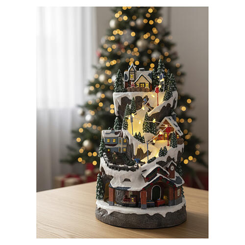 Weihnachtsdorf mit Skipiste Zug und LED-Lichtern, 40x20x25 cm 2