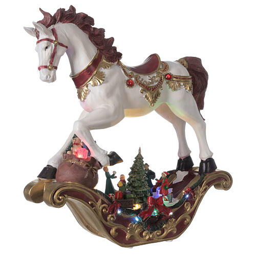 Pueblo Navidad caballo de balancín LED música 45x45x15 cm 4